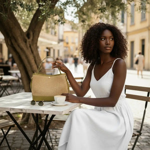 THE PAULI RAFFIA AND LEATHER HANDBAG thebagicon