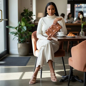 THE ZENOBIA WOVEN CLUTCH thebagicon