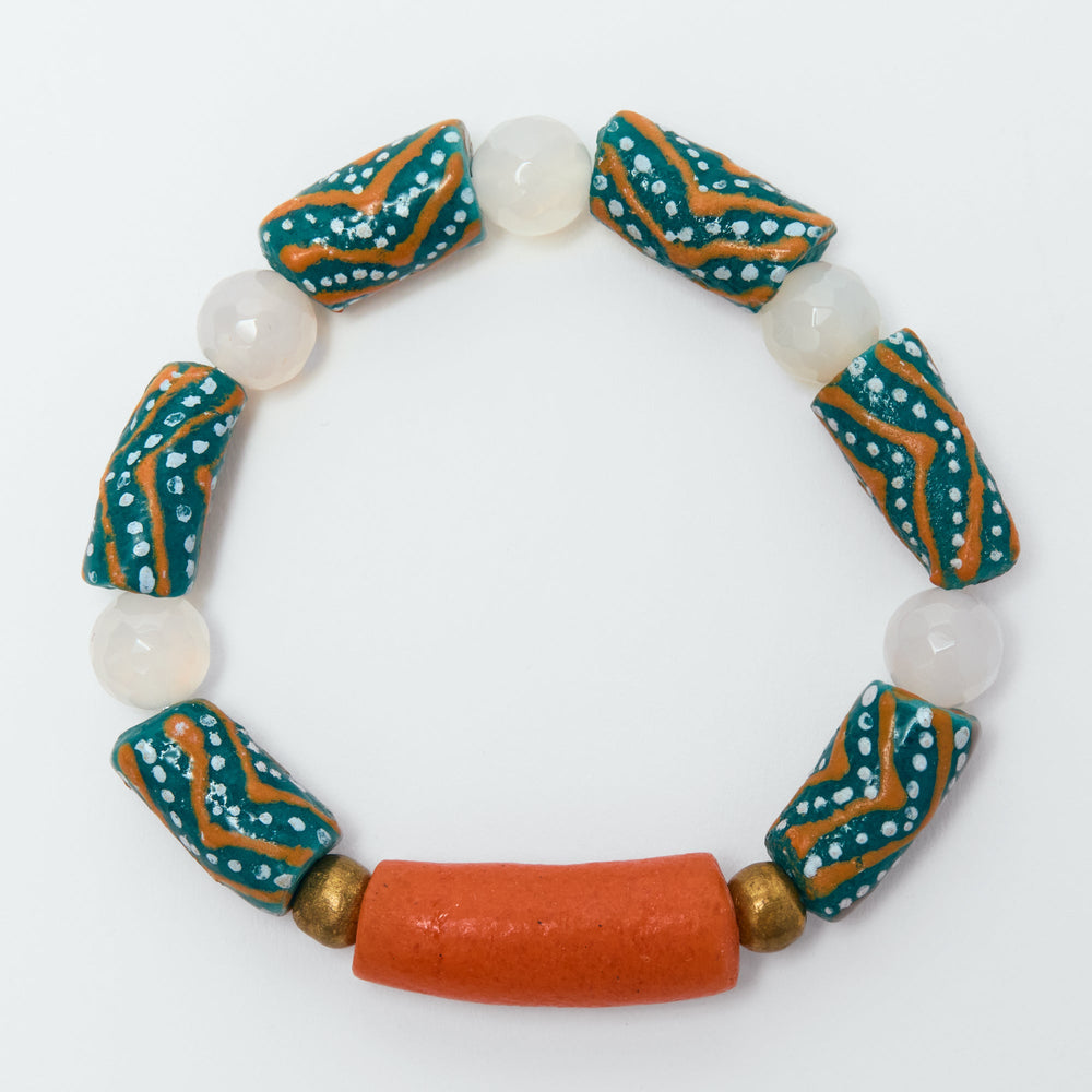 Bracelet with patterned beads on a white background