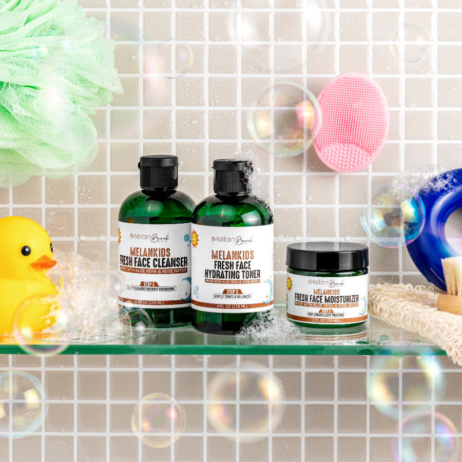 MelanKids skincare products on a bathroom shelf with bath items.