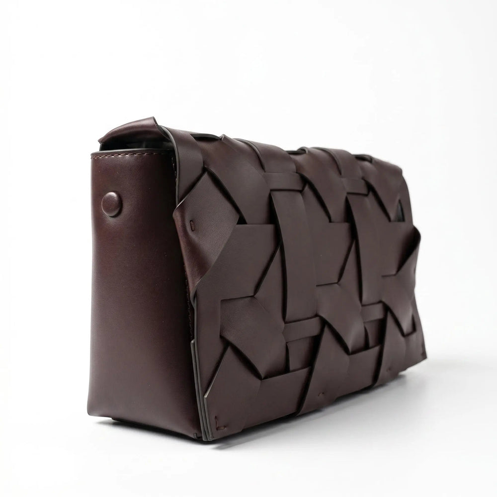 THE ZENOBIA WOVEN CLUTCH thebagicon