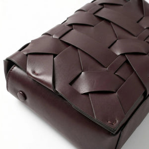 THE ZENOBIA WOVEN CLUTCH thebagicon