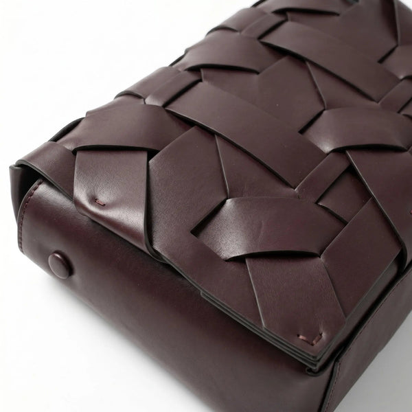 THE ZENOBIA WOVEN CLUTCH thebagicon