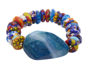 Colorful beaded bracelet with a large blue stone on a white background