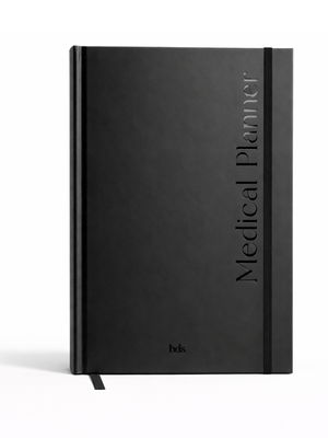 Black hardcover journal titled "Medical Planner" with a vertical elastic band closure. Features a sleek, minimalist design and a ribbon bookmark.