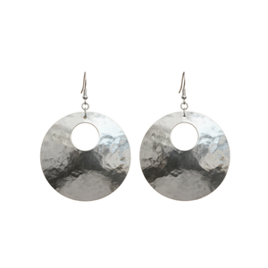 Pair of silver round earrings with a white background
