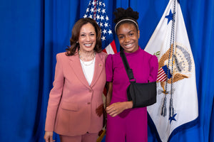 CEO Zoe Oli in photo with VP Kamala Harris