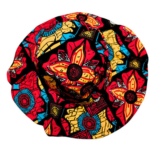 A colorfully patterned sun hat on a white background